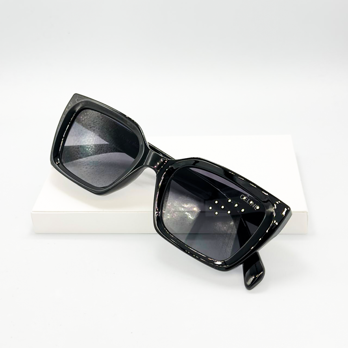 Lunettes de soleil Fammes : CELINE Noir