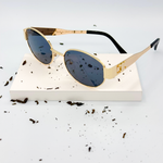 Lunettes de soleil Famme : CELINE Gold/Noir